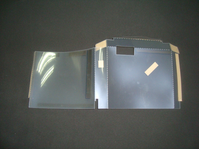 卷料PC冲切后产品仍翘起问题